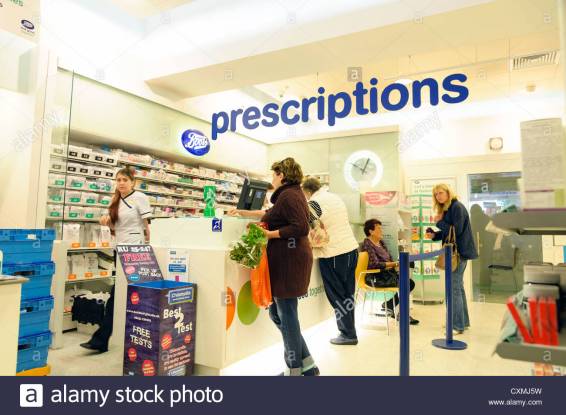 boots-chemist-prescription-counter-inside-the-store-in-cheltenham-CXMJ5W